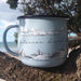 Wolfkamp & Stone NZ Mountains Enamel Mug | Koop.co.nz