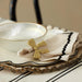 Assemble Gold Bow Napkin Ring | Koop.co.nz
