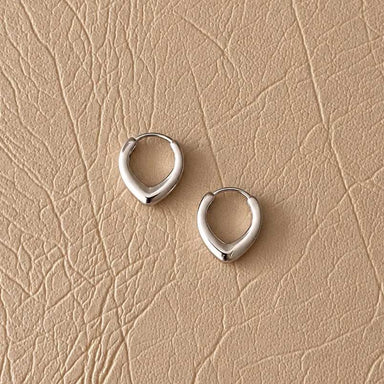 Lilio Jewellery Silver Curved Huggies | Koop.co.nz