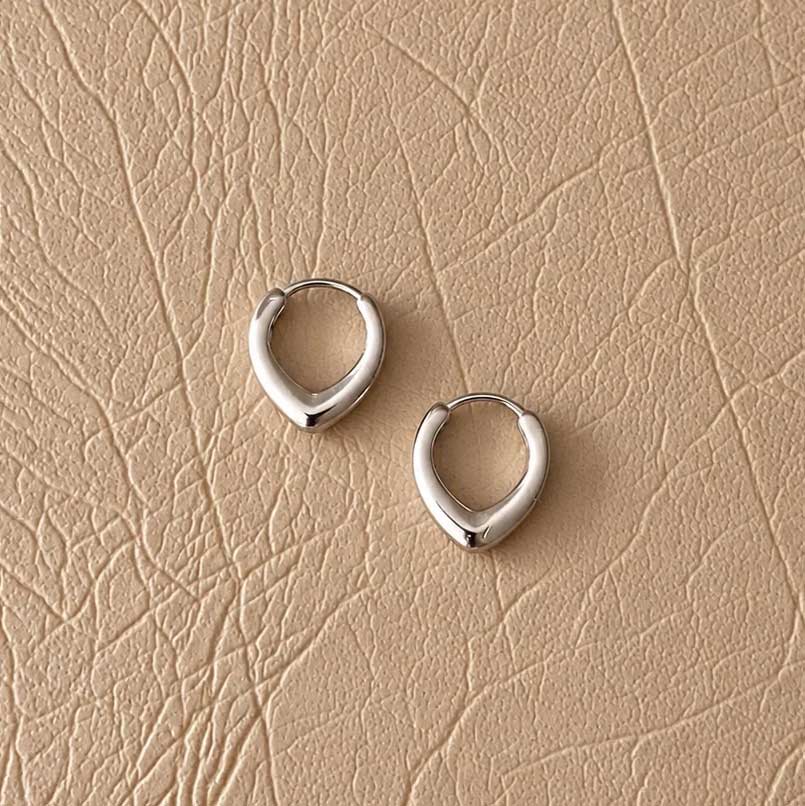 Lilio Jewellery Silver Curved Huggies | Koop.co.nz