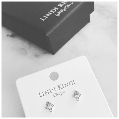 Lindi Kingi Tiny Cross Studs - Platinum | Koop.co.nz